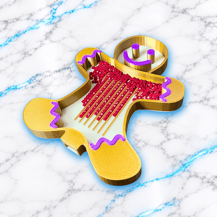 Vue en perspective du plateau 3D Diamond Painting bonhomme pain d'épice de Noël, doré avec décorations violettes, contenant des diamants carrés rouges alignés dans les rainures, création UnBrunBarbu.